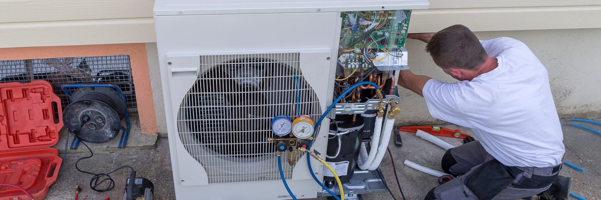 heat Pump. plumber at work installing a circulation pump