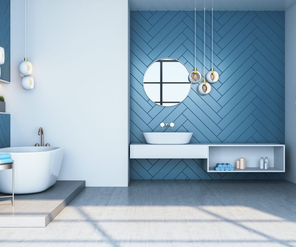 Modern blue bathroom interior with bath and decorative objects