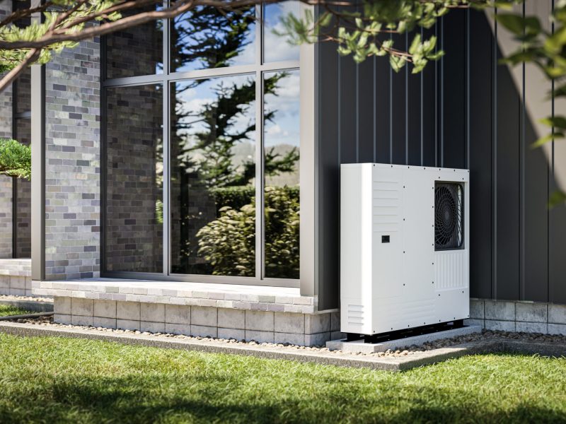 Heat pump installed at the wall of a single-family house 3d render showing renewable energy sources.